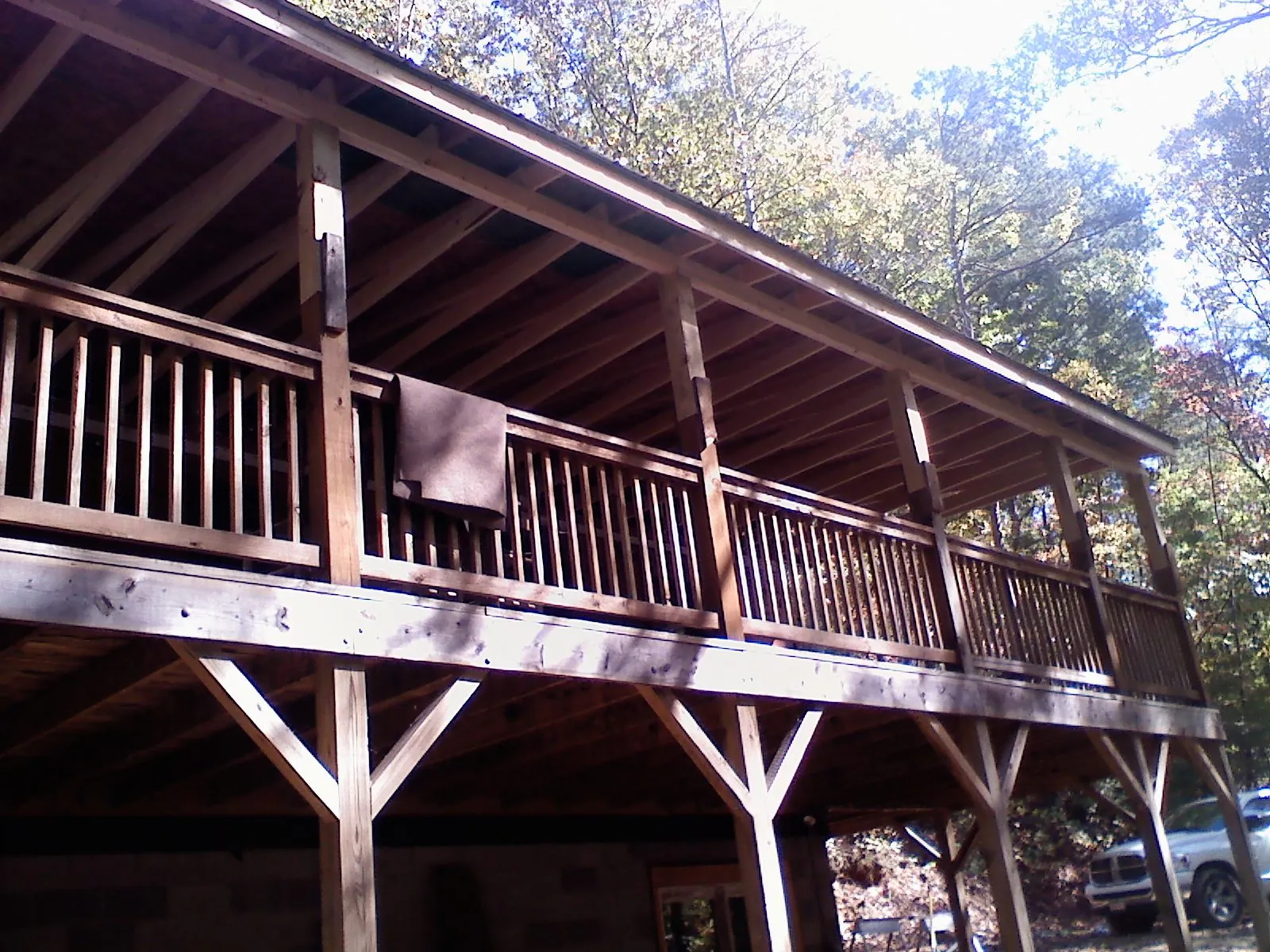 Timber framing under a new elevated porch and deck — Roof Leak Repair in East Waterford by Roofing Brothers